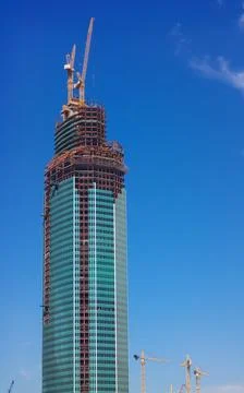 Skyscraper develop on sky background Stock Photos