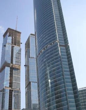 Skyscraper develop on sky background Stock Photos