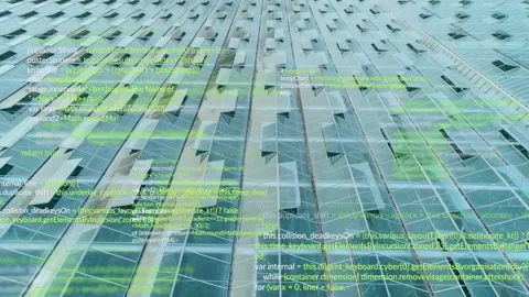 Skyscraper facade being overlaid with green code snippets on angled glass panels Stock Footage 309097985