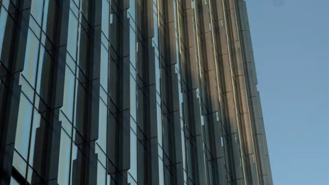 Skyscraper Glass Facade Sunset Timelapse with Moving Sunlight Stock Footage 328749105
