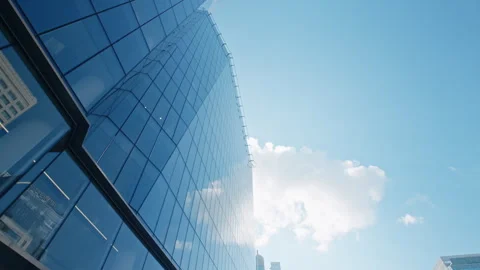 Skyscraper low angle dolly, financial district looking up modern architecture Stock Footage 240213333
