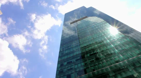 Skyscraper with moving clouds Stock Footage 25770229