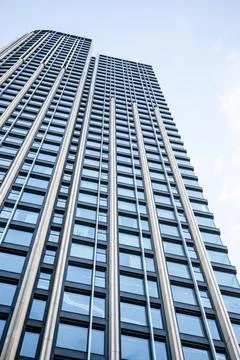 Skyscraper multi-storey building reaching for the sky, bottom view Stock Photos