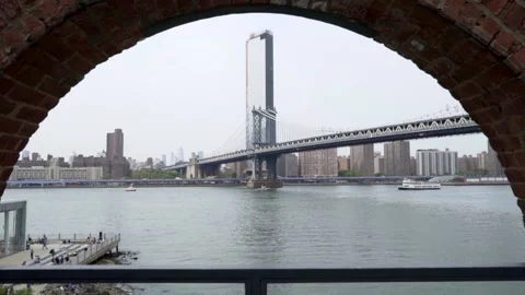 Skyscraper next to a bridge and river Video stock 168470345