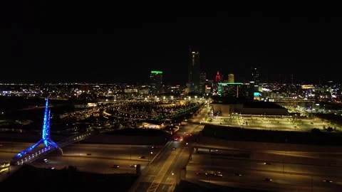 Skyscraper at night with art installation Stock Footage 240153460