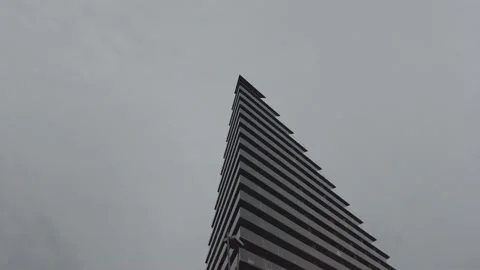 Skyscraper on an overcast day Stock Footage 169475804