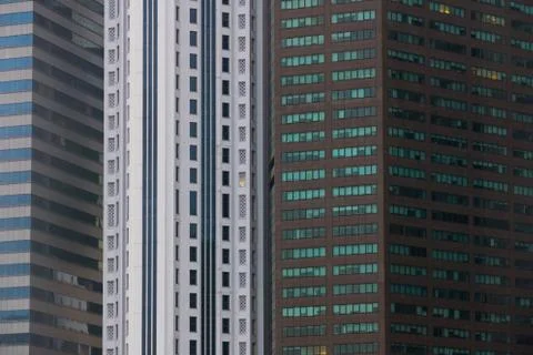 Skyscraper Pattern On Modern Business Building In Singapore Stock Photos