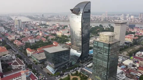 Skyscraper of Phenom Phen in the city center, overlooking the Mekong River. 4K Stock Footage 272452674