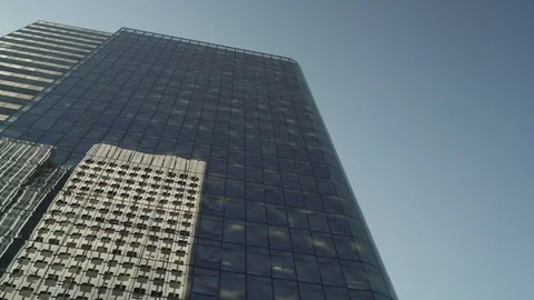 Skyscraper reflection with blue glass windows at business district in Paris, low Stock Footage 119361986