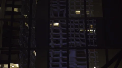 Skyscraper reflection with glass windows at business district in Paris at night, Stock Footage 119368706