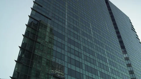 Skyscraper reflection with green glass windows at business district in Paris, 動画素材 119362740