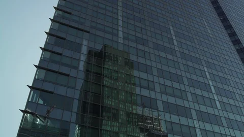 Skyscraper reflection with green glass windows at business district in Paris, Video stock 119362848