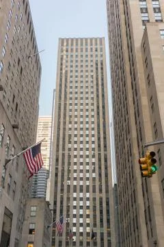Skyscraper seen from below with sunset light, new york. Stock Photos
