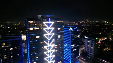 Skyscraper shot by a drone at night Stock Footage 253429262