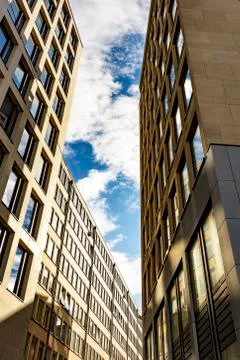 Skyscraper with square windows and sky Stock Photos