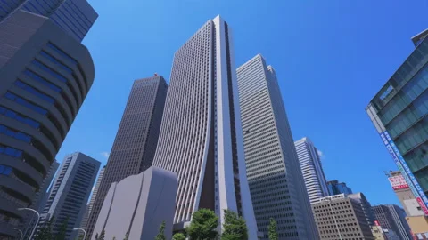 Skyscraper stands beyond the Pedestrian bridge along Ome Kaido at Shinjuku Stock-Footage 285166891