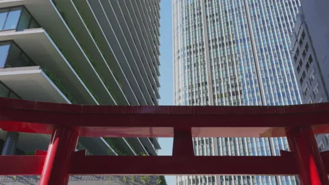 Skyscraper stands beyond the Torii Gate at Toranomon Hills in Tokyo Stock-Footage 281695759