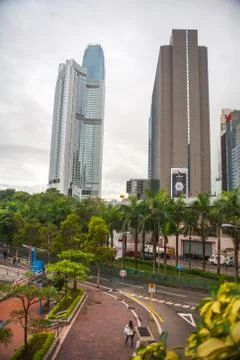 Skyscraper surrounded by trees Stock Photos