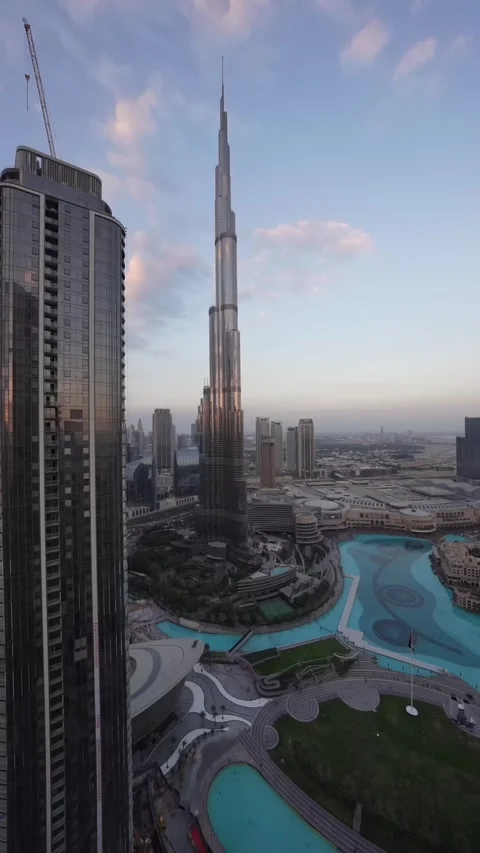 Skyscraper Time Zone Dubai Mall in Downtown Dubai in the evening, United Arab Stock Footage 241961884