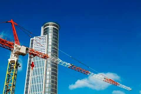 Skyscraper top &amp; crane excerpt Stock Photos