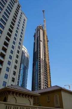 Skyscraper Under Construction in Urban Setting Stock Photos
