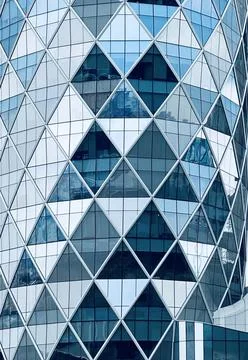 Skyscraper window reflections in blue Stock Photos