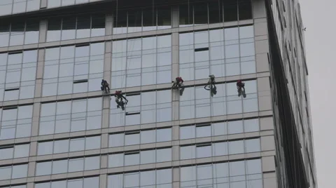 Skyscraper. Window washers. Stock Footage 61519948