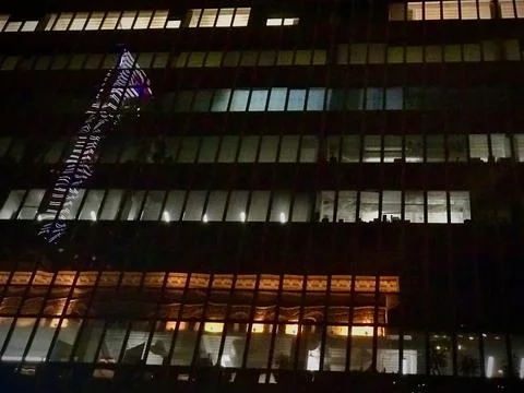 Skyscraper windows in the night Foto stock