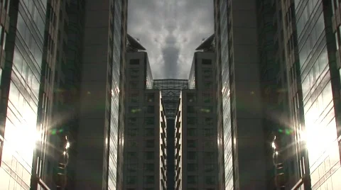 Skyscrapers and clouds mirror image Stock Footage 354930