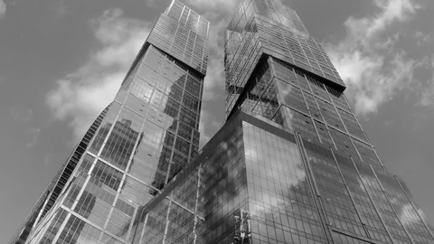Skyscrapers and sky with clouds black and white timelapse Stock Footage 81600664