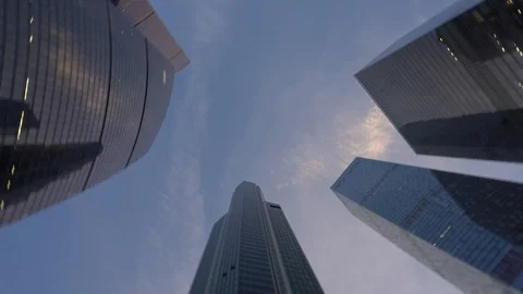 Skyscrapers bottom view with rotation Frame movement from bottom to top and back Stock Footage 105292882