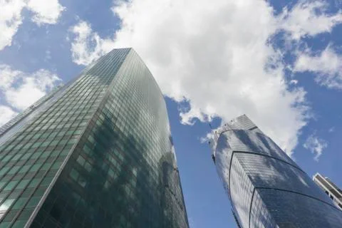 Skyscrapers with clouds Stock Photos