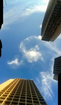 Skyscrapers with clouds Stock Photos