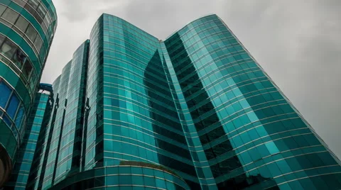 Skyscrapers with clouds reflection, timelapse. 스톡 동영상 55672422