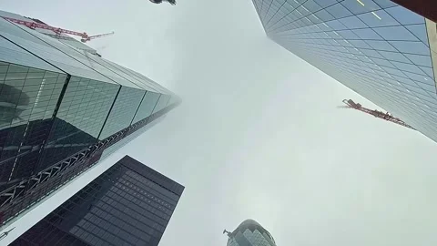 Skyscrapers disappear into the clouds. Stock Footage 242486624