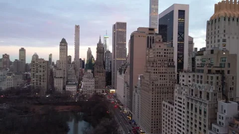 Skyscrapers pull out shot from Central Park Stock Footage 286053839