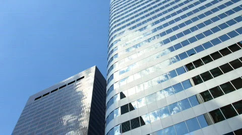 Skyscrapers reflecting Clouds Time Lapse Stock Footage