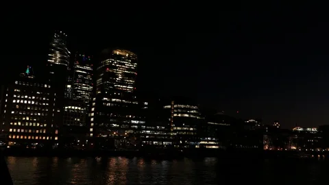 Skyscrapers reflecting in the Thames Stock Footage 121067116