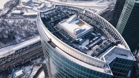 Skyscrapers rooftop aerial view winter business center industrial AC fans Stock Footage