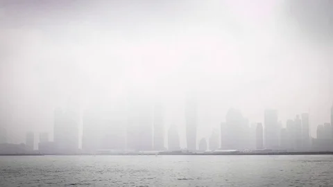 Skyscrapers surrounded by fog Stock-Footage 77745641