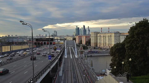 Skyscrapers, Third Ring Road and trains on Moscow Central Circle line Time-lapse Video stock 119127347