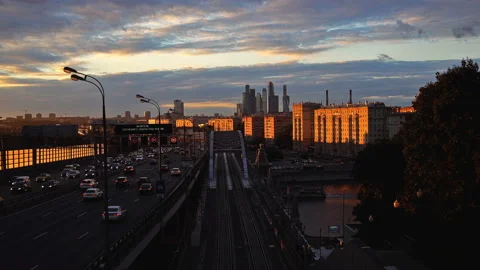 Skyscrapers, the Third Ring Road and the ES2G Lastochka trains - Moscow Video stock 120608061