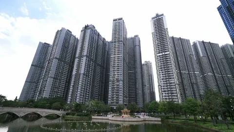 Skyscrapers viewed from below towards sky represents urban development Stock Footage 155871399