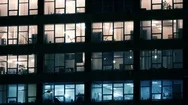 Skyscraper's Windows Lit At Night. Modern Office Building With Windows Glowing. Stock Footage