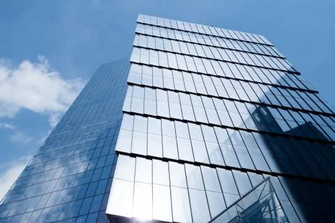 Skyscrapper seen from below. Losing itself in the sky. Stock Photos