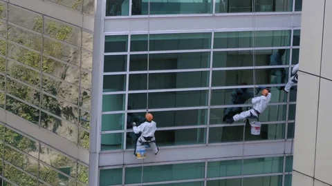 SKYSCRAPPER WINDOW CLEANERS WORKING Stock Footage 74503630