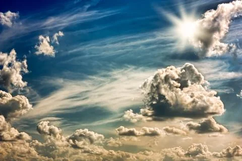 Sky,sun and clouds Stock Photos