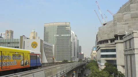 Skytrain and Buildings in Bangkok City Thailand Stock Footage