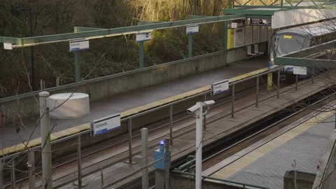Skytrain arriving at the station. Video stock 147906574