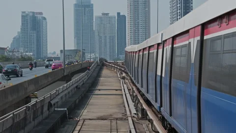 Skytrain BTS moving in center of Bangkok Stock Footage 334227084